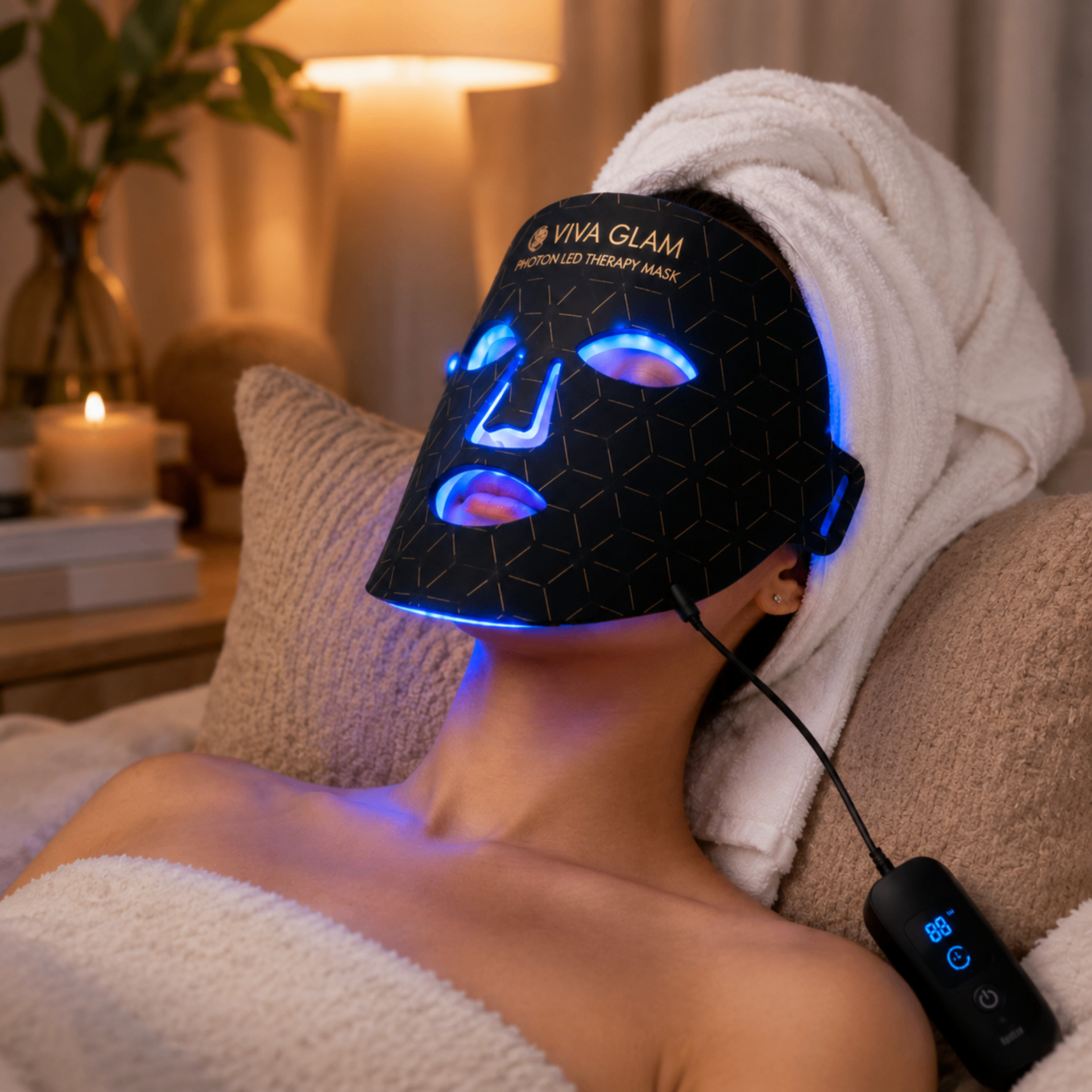 A creator wearing the photon LED mask with a blue glow at night